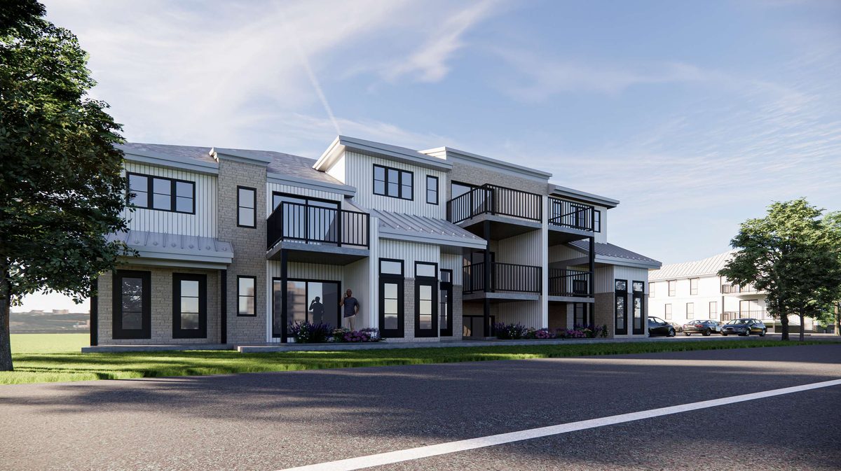 Une famille heureuse devant son nouveau condo Gesteco