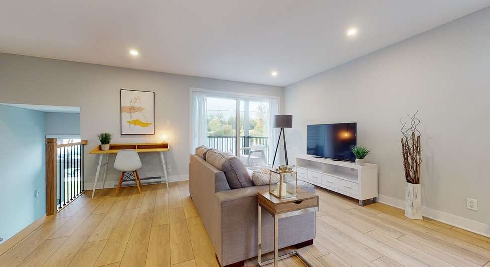 Intérieur lumineux d'un condo Gesteco à Granby